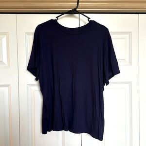 Navy Blue short sleeve shirt.